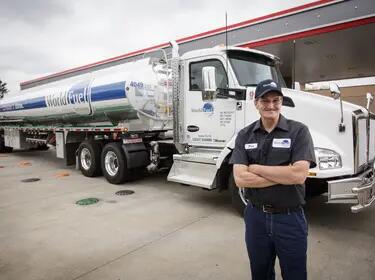 WFS Driver in front of truck