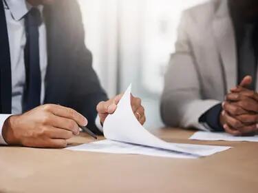 Person signing contract
