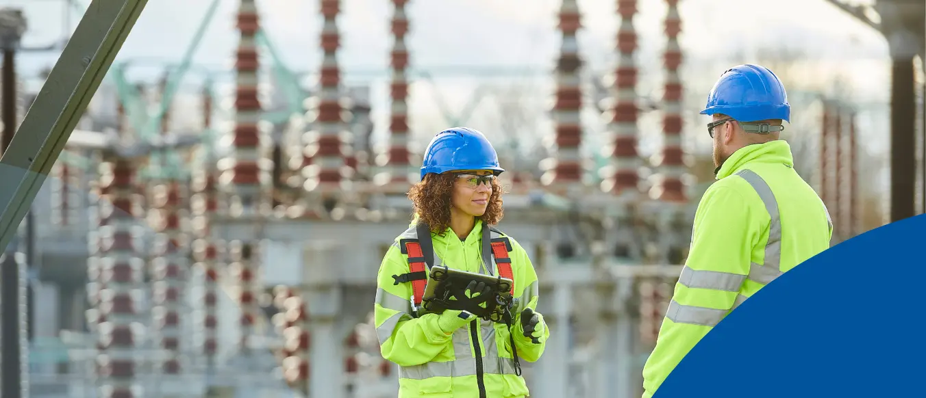 substation power workers talking with each other