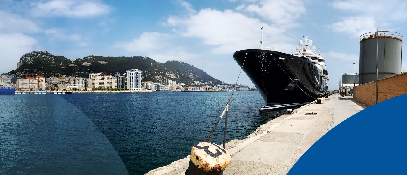 black bow of a ship at a dock