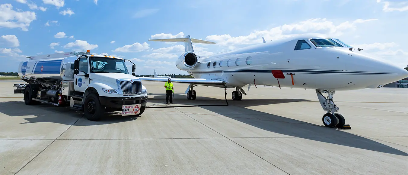 World Fuel branded truck with private jet