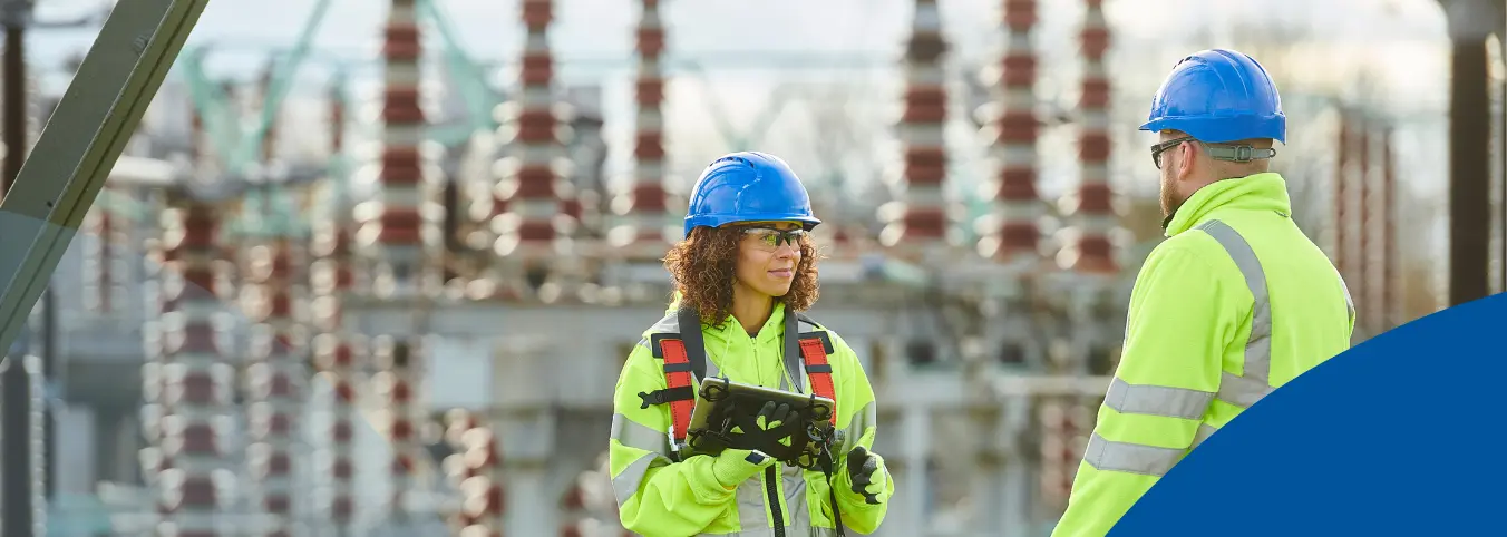 substation power workers talking with each other