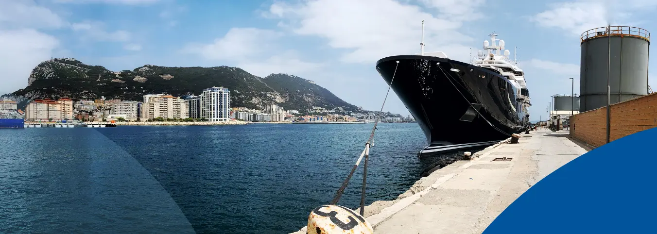 black bow of a ship at a dock