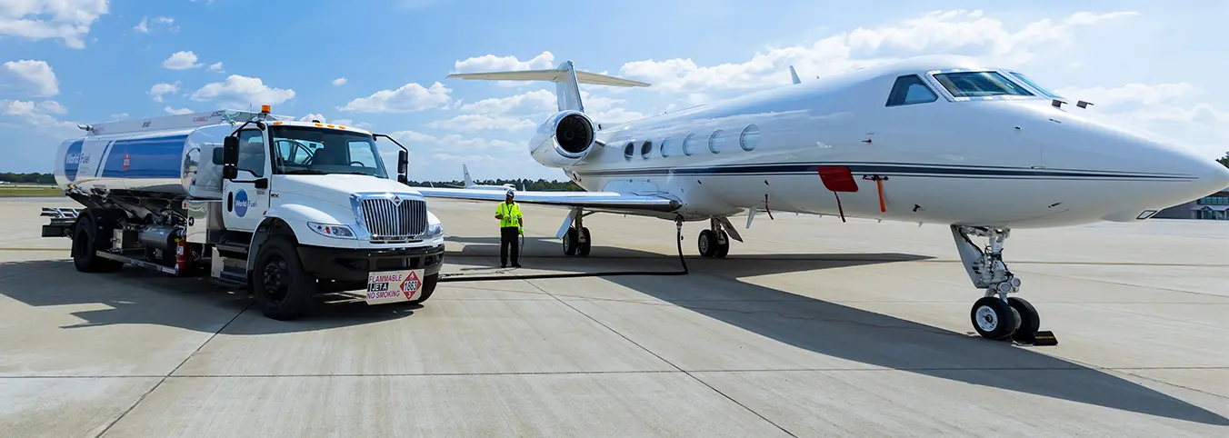 World Fuel branded truck with private jet