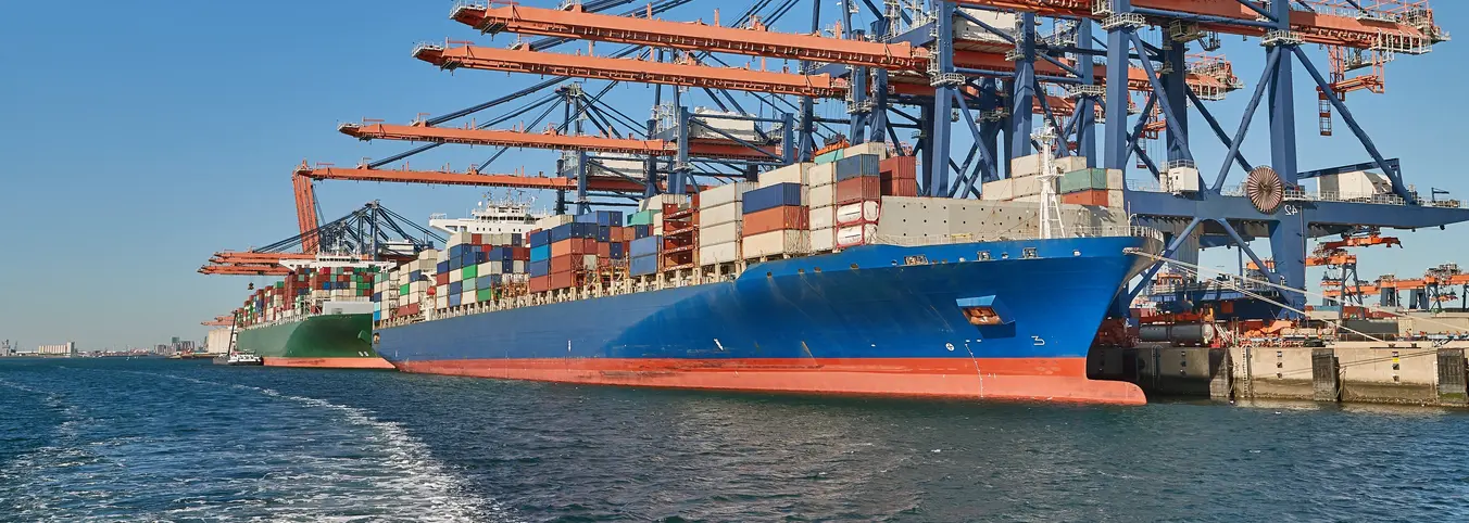 Container ship unloading at port