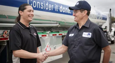 driver and customer shaking hands
