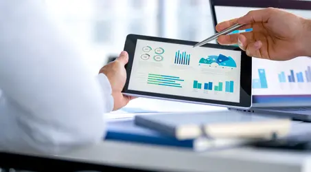 Close up of a tablet with data on the screen
