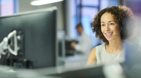 Rep in front of computer