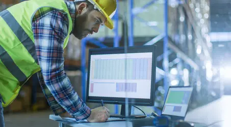 man looking at the computer