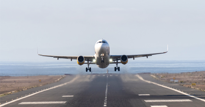 airplane above runway