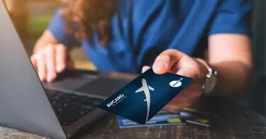 Aviation credit card, AVCARD, blue card with silver airplane, in a wallet