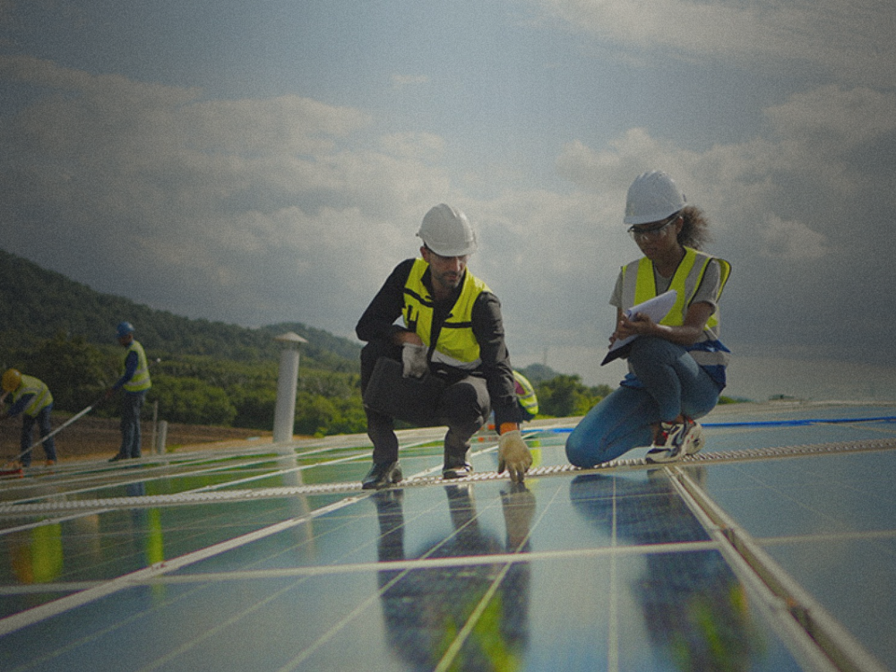 construction workers on solar panels