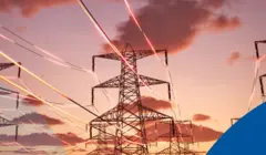 sunset behind power lines